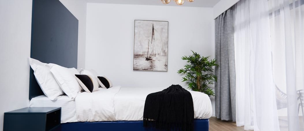 Tastefully  two bedroom  fully furnished  near junction  mall pool gym lifts borehole 180k12